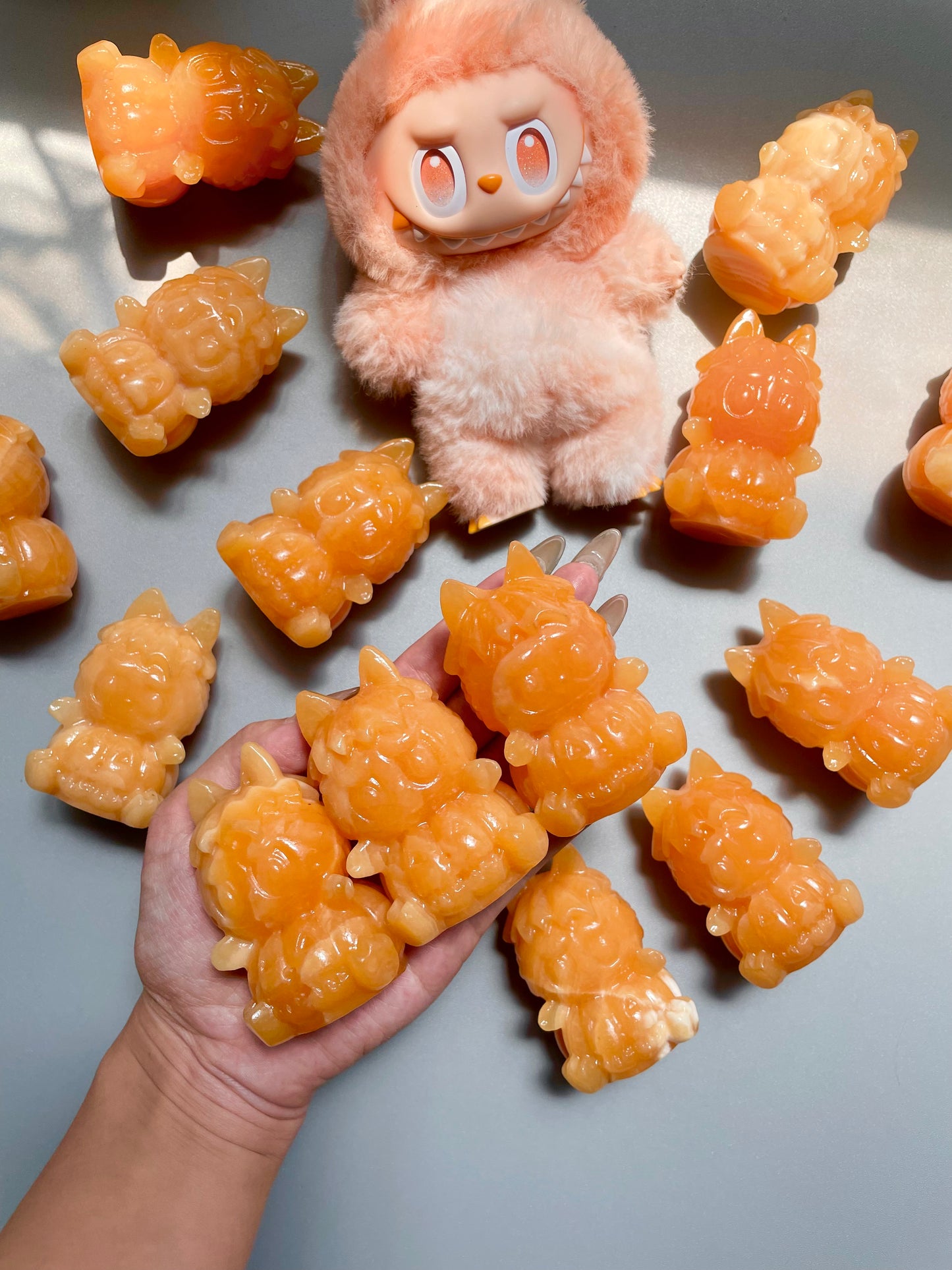 Orange calcite LABUBU with pumpkin