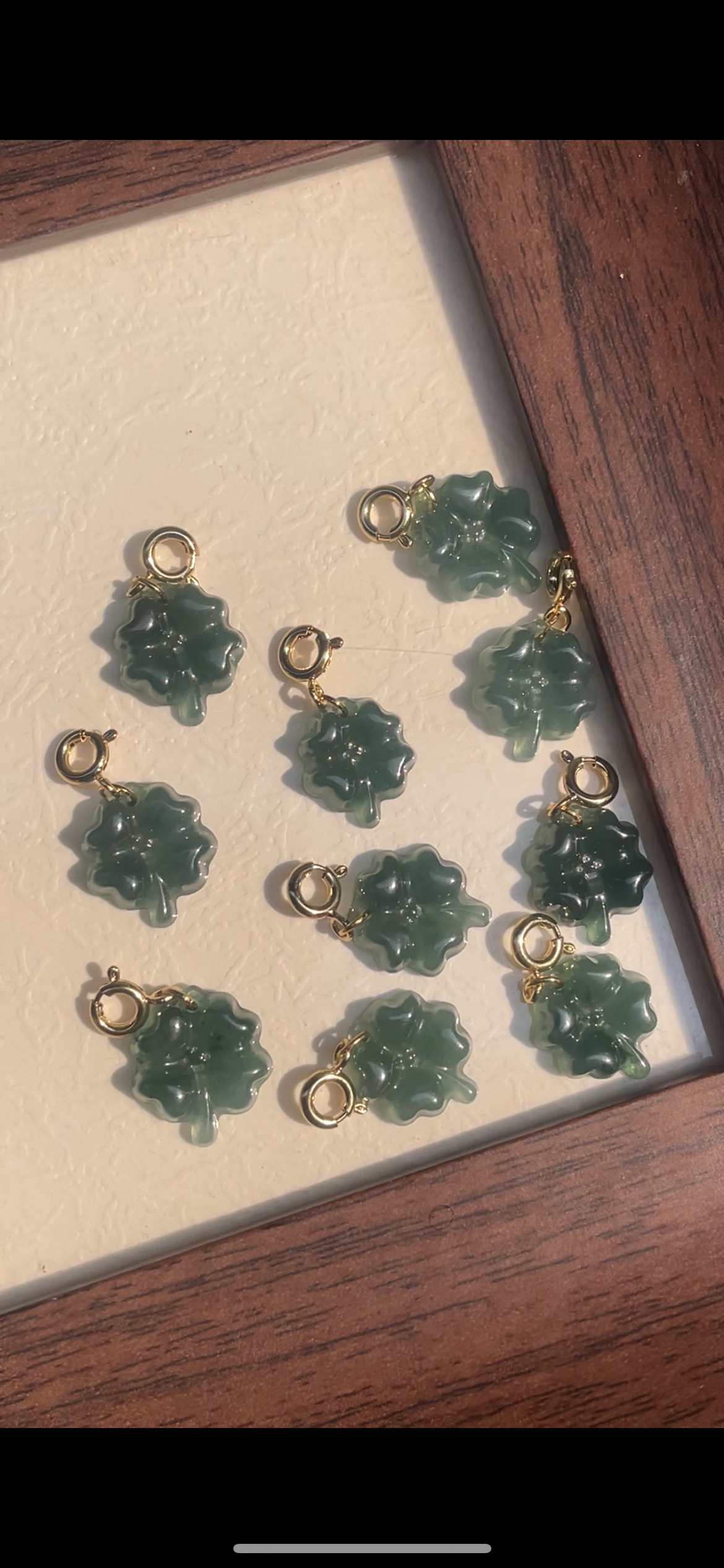 blue water jadeite four-leaf clover pendant
