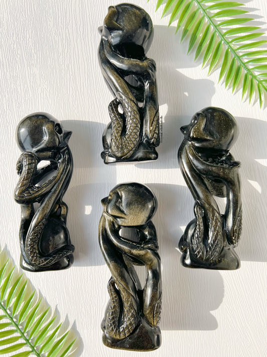 Golden obsidian octopus with skull