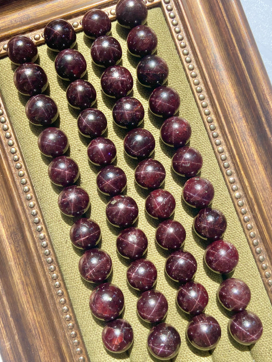 garnet sphere with star